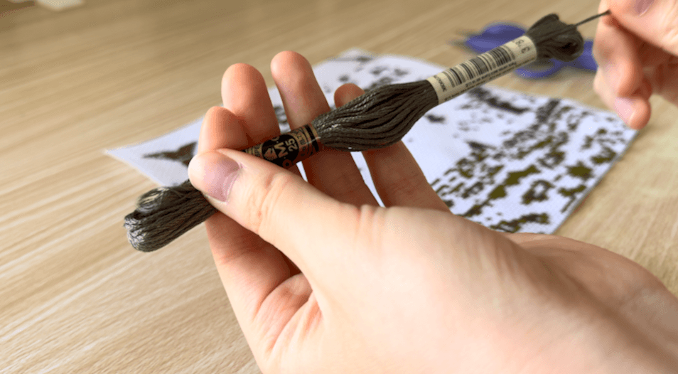 Preparing embroidery floss by separating strands