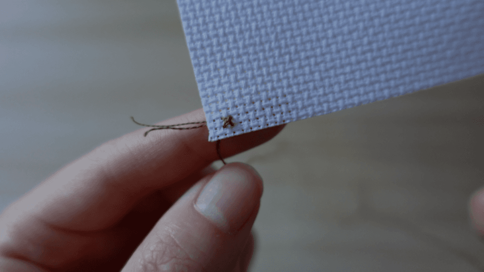 Continuing with the next stitch while maintaining consistent tension